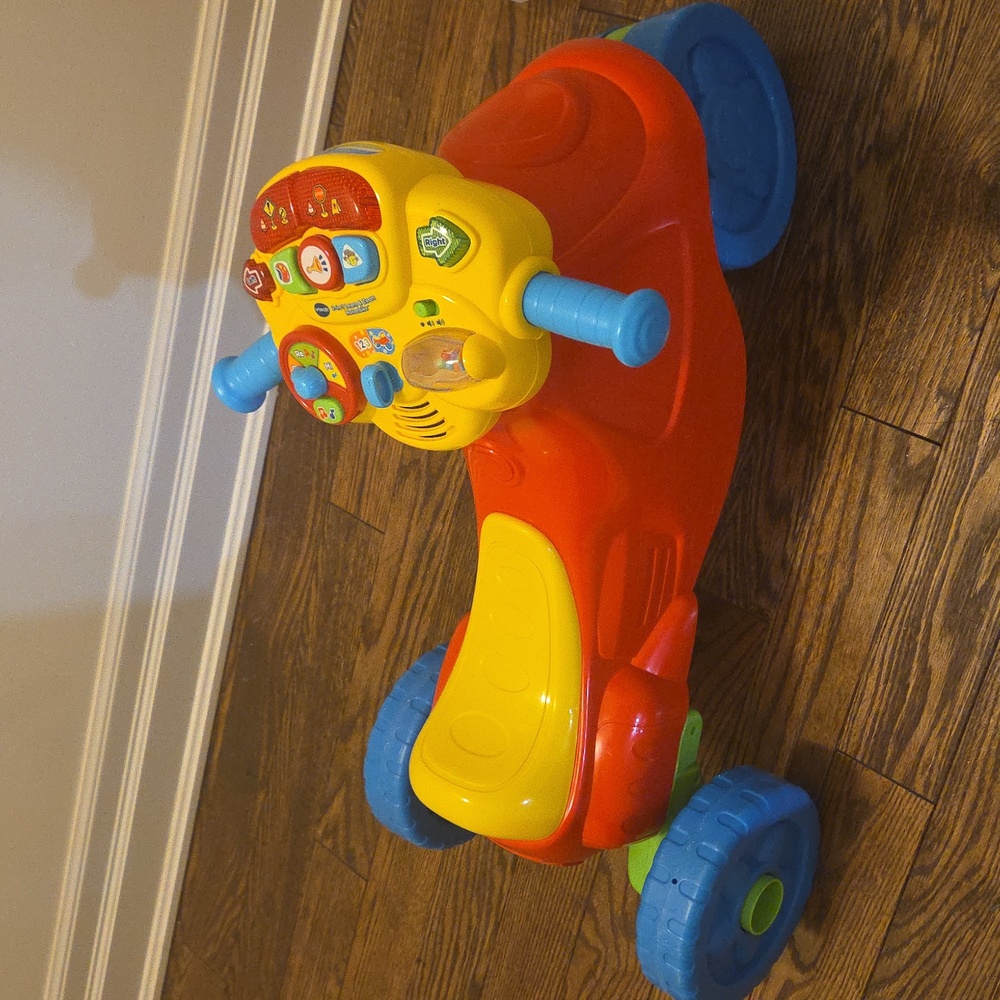 VTech 2 in 1 learn and zoom motorbike tricycle